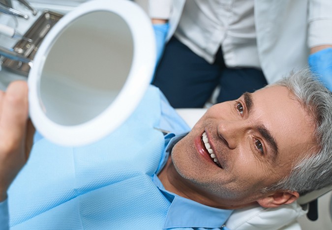 Man smiling at the dentist