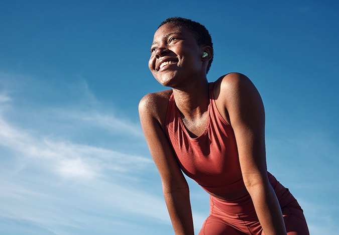 Lady smiles outdoors